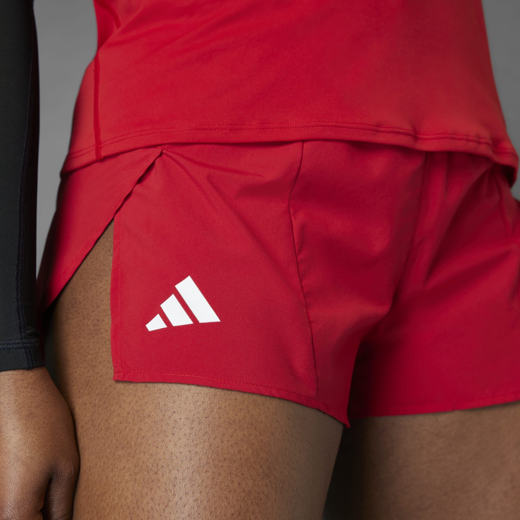 adidas Adizero Essentials Split Shorts Women - tempo red IX2847