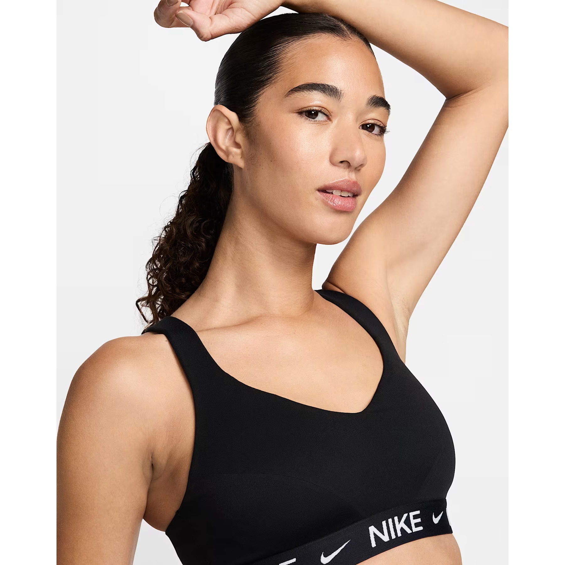 nike training indy bra with logo taping in black