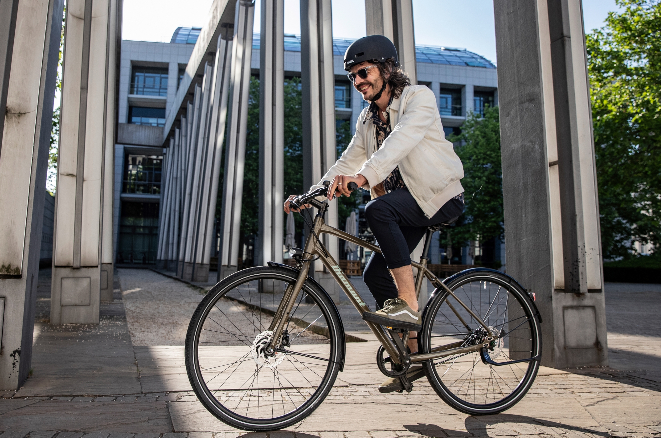 Man on Diamant e-Bike cycling through the city