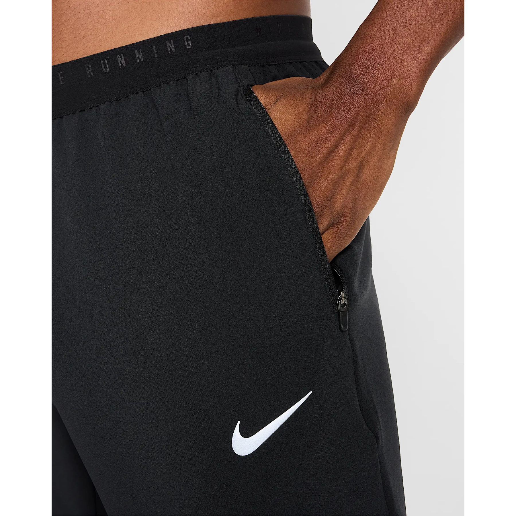 nike essential woven running