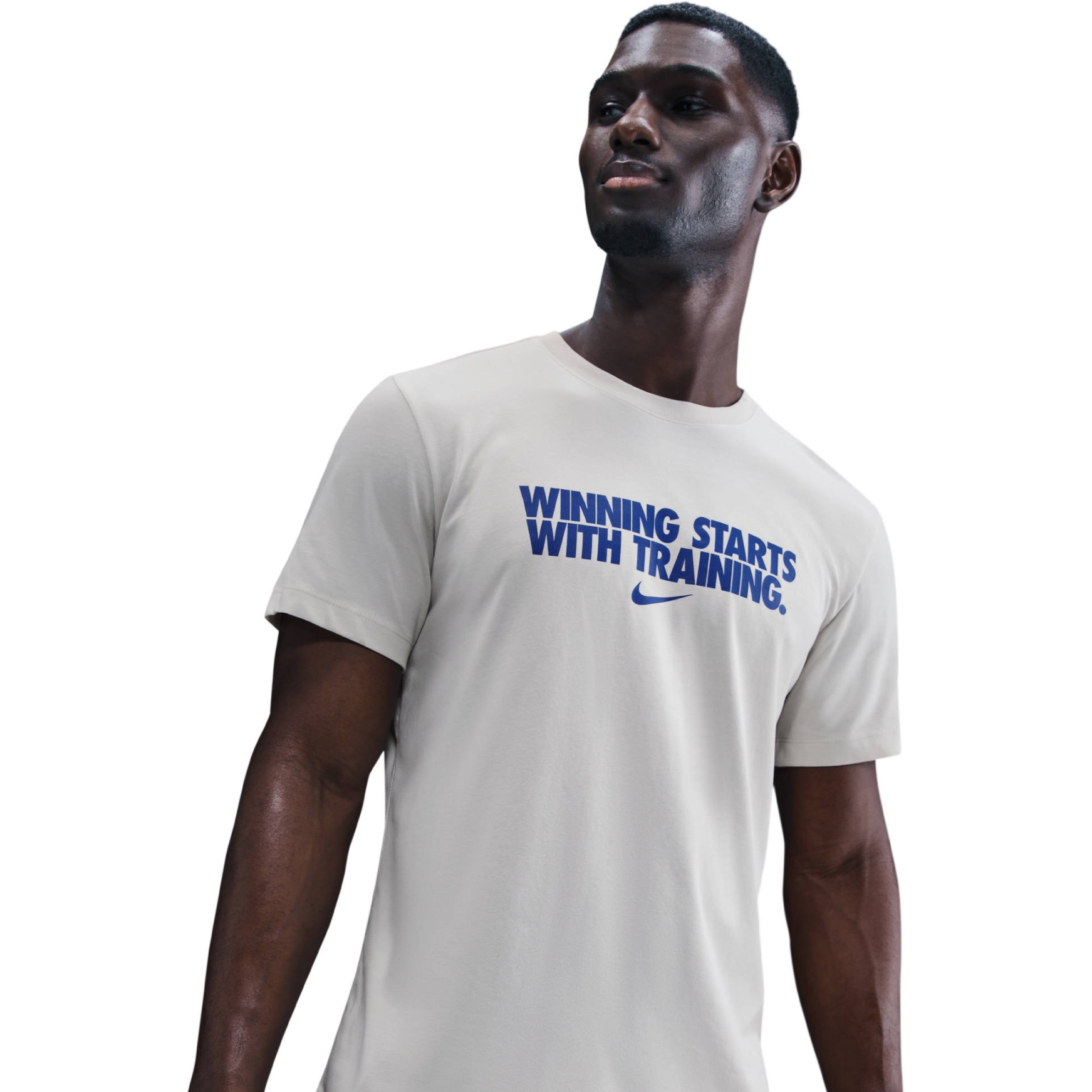 white nike shirt with blue logo