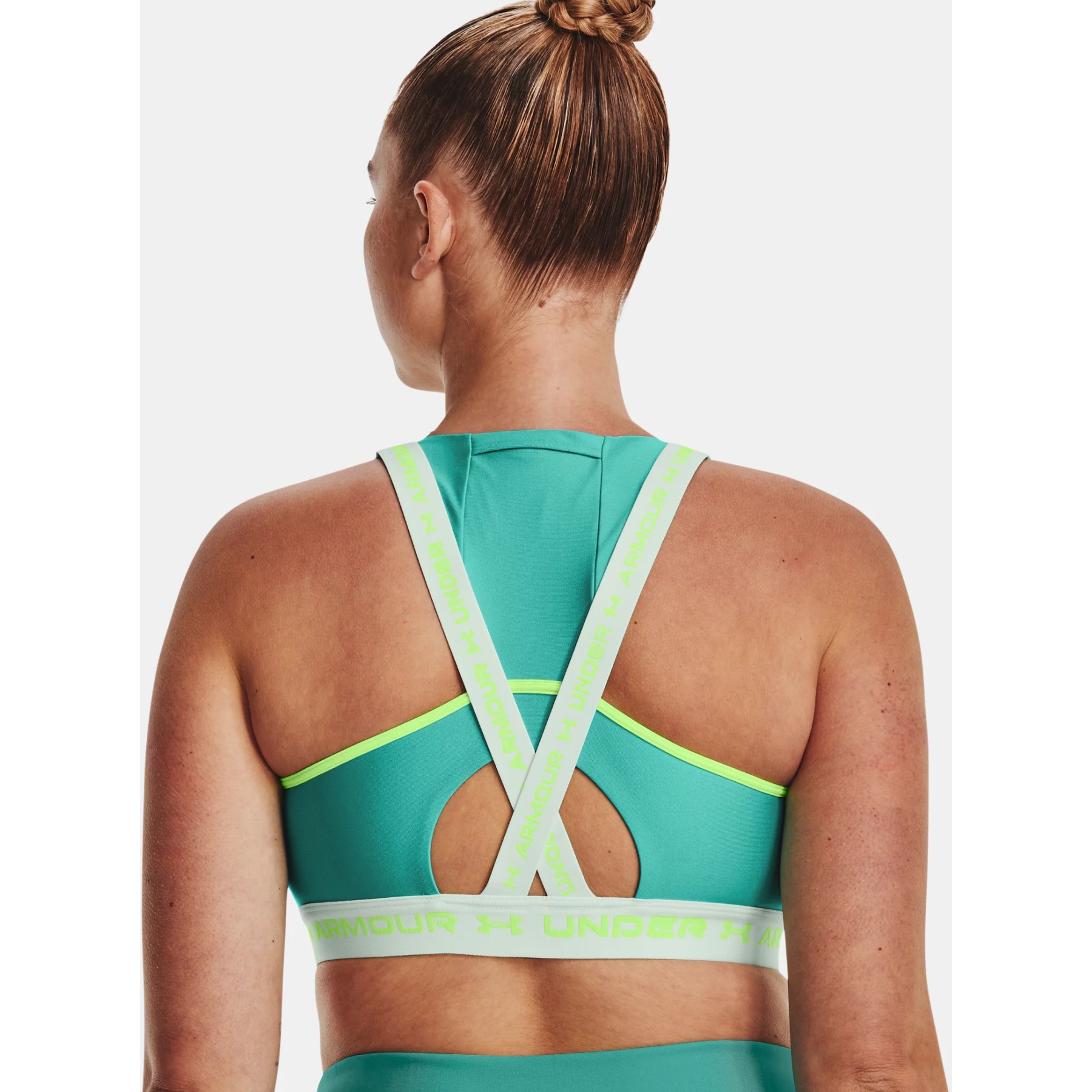 https://images.bike24.com/i/mb/d5/aa/e3/under-armour-womens-armour-mid-crossback-pocket-sports-bra-neptune-sea-mist-quirky-lime-12-1158760.jpg
