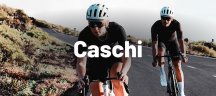 persone in bici con casco fizik