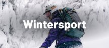 Osprey Rucksäcke: Perfekte Begleiter beim Wintersport Mann im Winterwald mit einem Osprey Rucksack