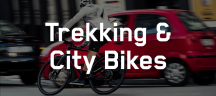Orbea Bikes – hochwertige Trekking & City Fahrräder Orbea Trekking- und City-Bike-Kategorie Banner, der eine fahrende Person in der Stadt zeigt und der Aufschrift Trekking & City Bikes
