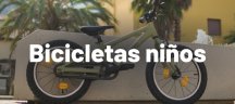 Bicicleta CUBE para niños por fuera de una zona resindencial